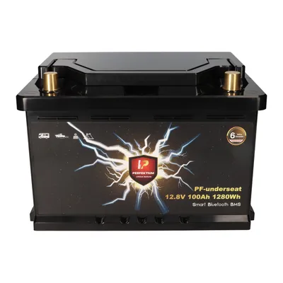 A black battery with gold terminals and a lightning bolt graphic on the side.