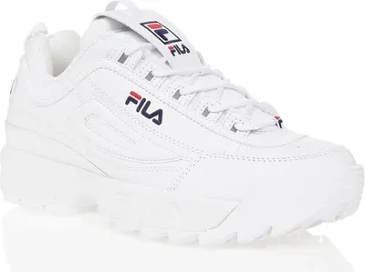 A white Fila Disruptor Low sneaker is shown from a side angle against a white background.