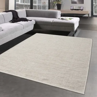 Productafbeelding van Modern handgeweven wollen vloerkleed, effen, in crème-beige kleur, afmetingen: 160 x 230 cm