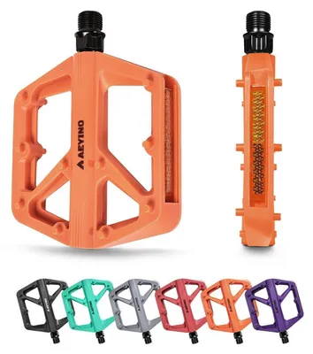 Image de Pédales de vélo en nylon, plate-forme de 9/16", couleur orange, avec réflecteurs et picots antidérapants