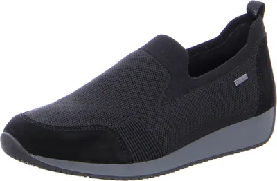 A black slip-on shoe with a gray sole, shown from the side against a white background.
