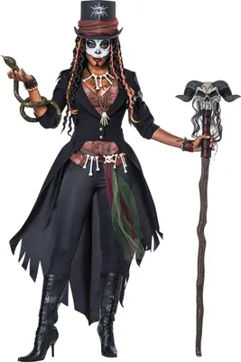 A woman in a voodoo costume holding a snake and a staff.