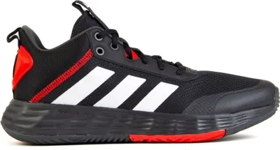 A side view of a black Adidas sneaker with white and red accents.