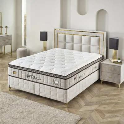 Produktbild von Wooltouch Bett Boxspringbett mit Matratze 140x200
