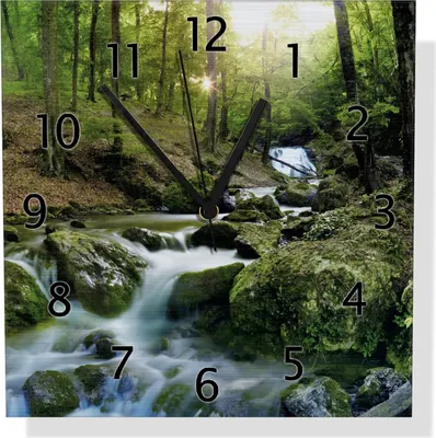 Produktbild von Wallario Design Wanduhr Fließender Bach im Wald bei Sonnenuntergang aus Aluverbund, Größe 30 x 30 cm