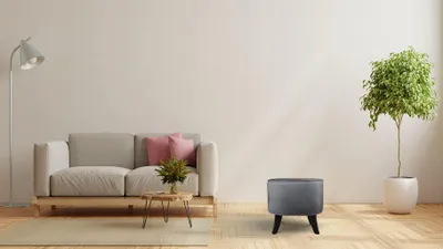 Produktbild von MG Design Ovaler Samt-Hocker 42 x 52 cm in Grau mit Holzbeinen - Gepolsterter Fußhocker für Wohnzimmer oder Schlafzimmer