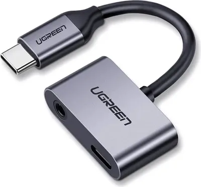 A Ugreen USB-C to 3.5mm audio adapter with a USB-C charging port is shown against a white background.