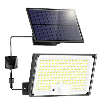 A solar-powered outdoor light with a separate solar panel.