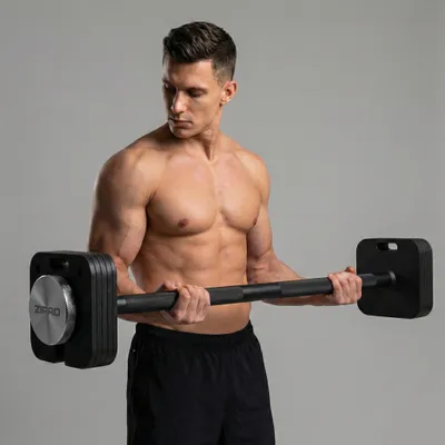 A man is performing a bicep curl with a barbell.