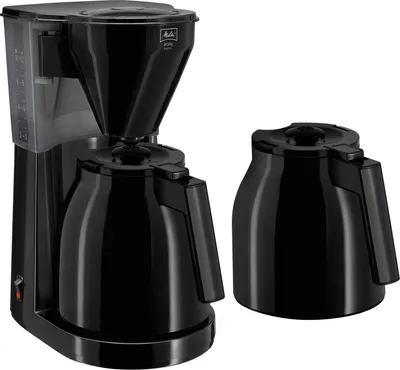 A black Melitta coffee maker with a thermal carafe and an extra carafe.