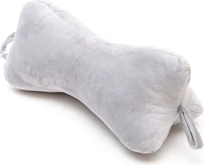 A light gray, bone-shaped pillow is shown against a white background.