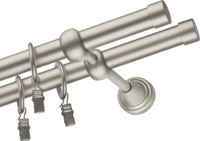 A double curtain rod with rings and clips, shown against a white background.