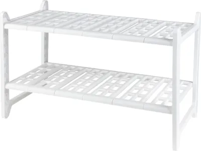 A white, two-tiered shelf unit, likely for under a sink or for storage.