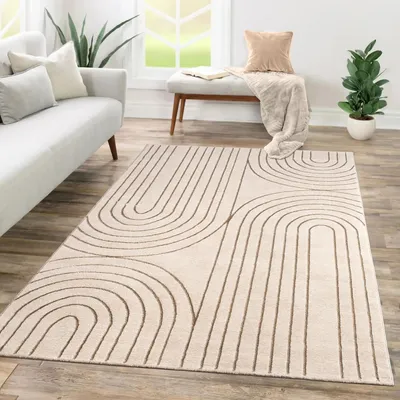 A living room scene with a couch, rug, and bench.