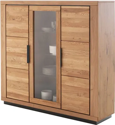 A wooden cabinet with glass doors.