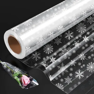 Produktbild von Cellophan Geschenkfolie Rolle mit Schneeflocken, 80 cm x 30 M für Geschenke