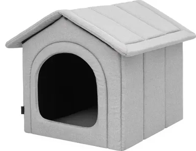 A light gray fabric dog house with an arched entrance.