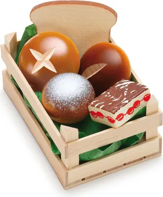 A collection of toy baked goods in a wooden crate.