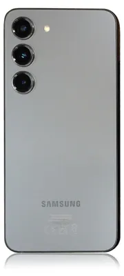 The back of a silver Samsung Galaxy S23 smartphone.