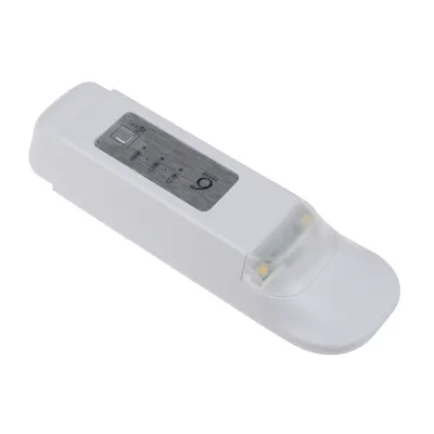 A white electronic device with a control panel and indicator lights.