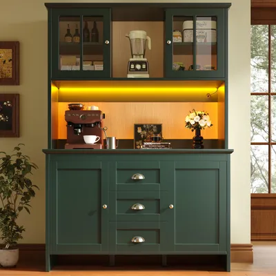 A kitchen hutch with a coffee maker, blender, and decorative items.