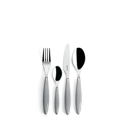 A set of four cutlery pieces arranged in a row on a white background.