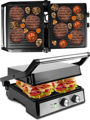 A grill with burgers and vegetables on the top plate and sandwiches on the bottom plate.