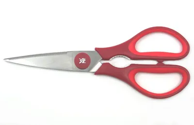 A pair of red-handled kitchen scissors on a white background.