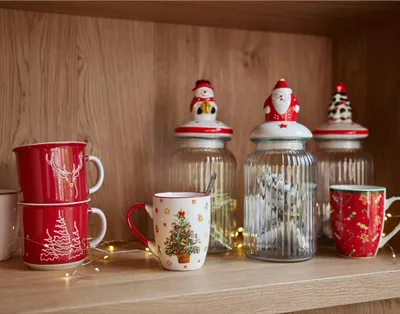 Produktbild von Tasse Porzellan mit Griff 10,5cm Weihnachtsmuster 340ml 1 Stück sort.