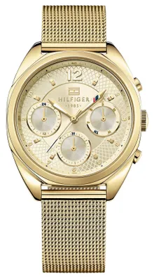 A studio shot of a gold Tommy Hilfiger analog watch with a mesh band.