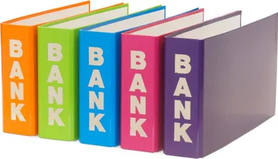 Five colorful binders are lined up on a white background.