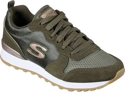 A studio shot of a single green Skechers sneaker.