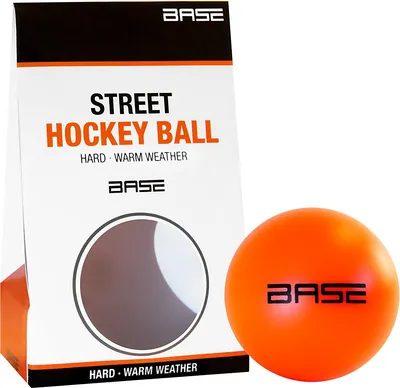 Obrázok produktu pre Lopta BASE Street Hockey – odolná, teplotne odolná tréningová lopta pre inline a street hokej, dobre viditeľná v oranžovej farbe, ideálna pre haly a asfalt, kvalitná a cenovo dostupná pre všetky úrovne hry