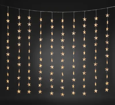 Produktbild von Konstsmide LED Lichtervorhang, 120 Sterne, 120 bernsteinfarbene Dioden, 30V Innentrafo, 3,6W, transparentes Kabel- 3703-803