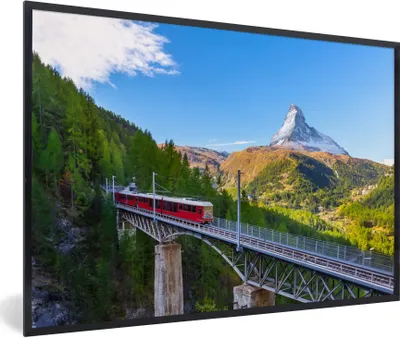 Produktbild von MuchoWow® Gerahmtes Poster Ein Zug in den Alpen 90x60 cm - Poster mit Schwarzem Bilderrahmen Wandposter Rahmen Foto Bilder - Fotorahmen - Foto-Plakat