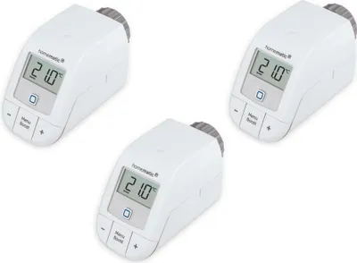 Three white smart thermostats are arranged diagonally on a white background.