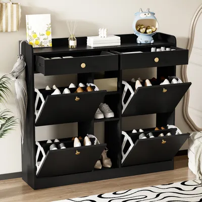A black shoe cabinet with multiple compartments and drawers, filled with shoes and decorative items.