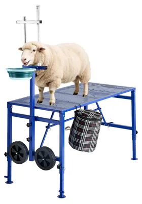 Obrázok produktu pre VEVOR, stojan na dojenie kôz, nosnosť 272 kg, skladací stojan na dojenie kôz s krmivom, kolesami, nastaviteľnou hlavou a úložným košom na náradie, určený na starostlivosť o srsť a pazúry, rozmer 1195x584x838 mm, modrej farby