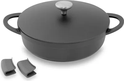 A black cast iron pot with a silver lid handle and two gray silicone pot holders.