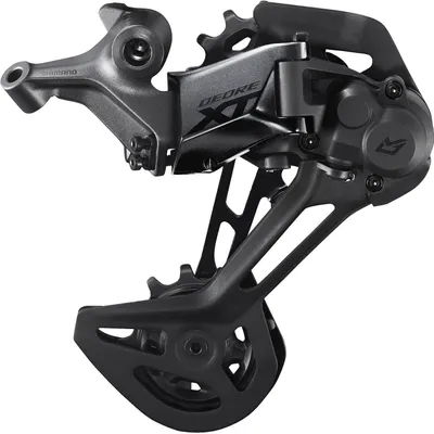 A close-up studio shot of a bicycle rear derailleur.
