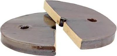 Two brown, semi-circular weights are shown on a white background.