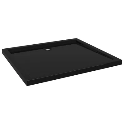 A black rectangular shower tray with a drain hole.