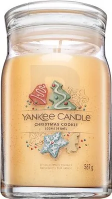 A Yankee Candle Christmas Cookie scented candle in a glass jar.