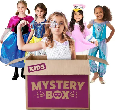 Five young girls in various costumes are posing around a cardboard box labeled 'Mystery Box'.