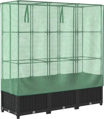 A green greenhouse on top of a black planter box.