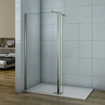 A modern bathroom with a glass shower enclosure and a white shower tray.