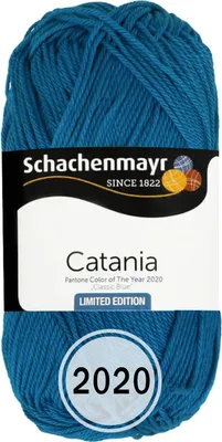A ball of blue yarn with a label.