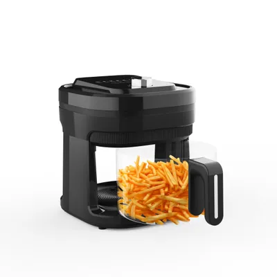 A black air fryer with a clear basket filled with french fries, shown against a white background.