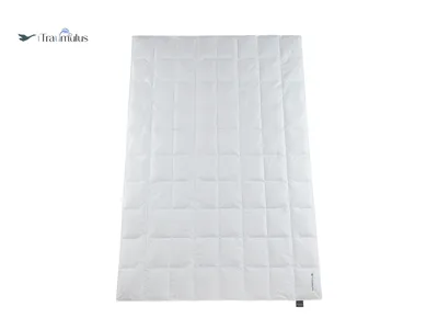 A white duvet laid flat on a white background.