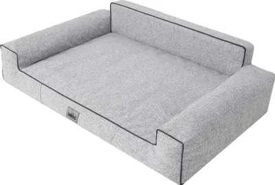 A dog bed is shown from a diagonal angle on a white background.